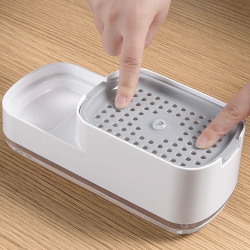 Detergent dispenser og svampholder til vask